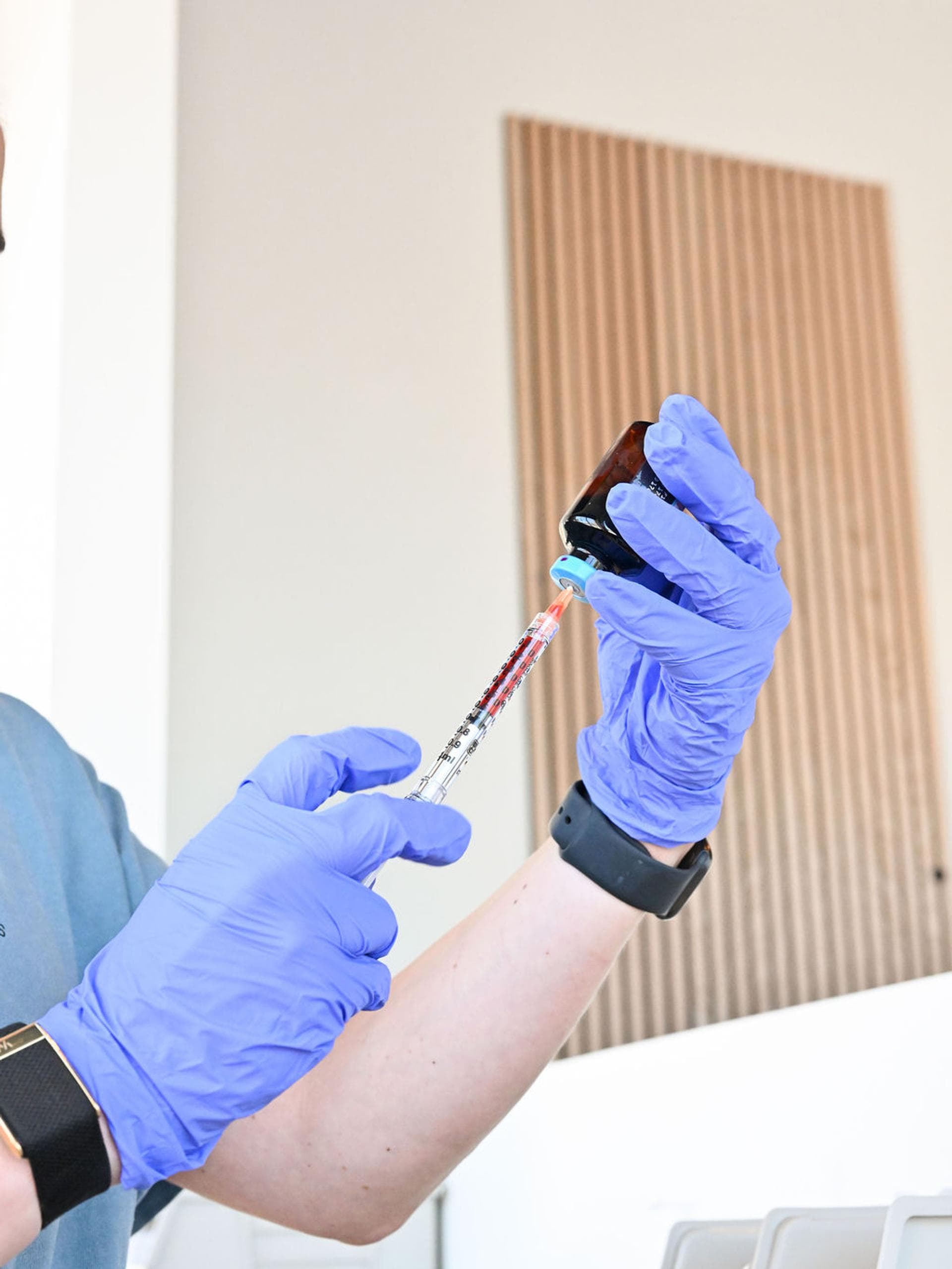A nurse drawing a wellness injection at Vivolo Wellness Club